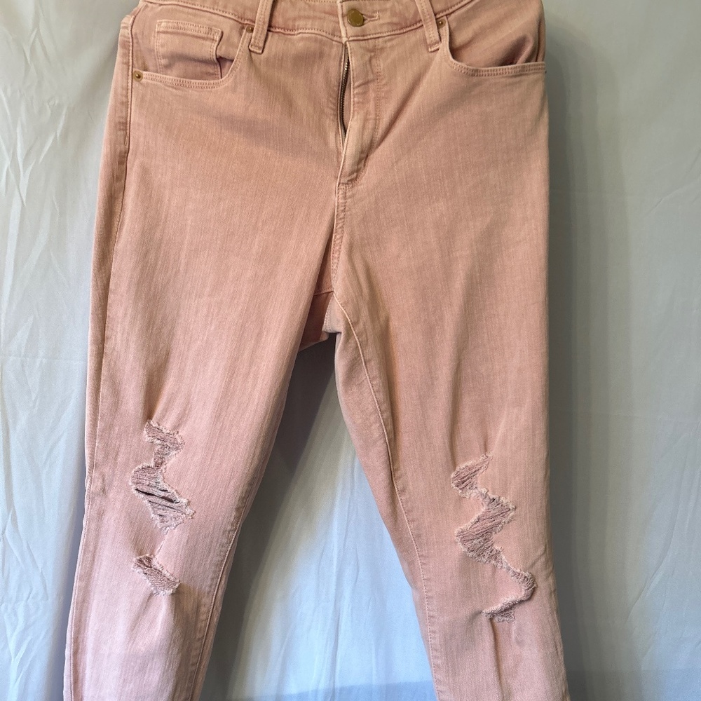 Rose colored ripped ankle/low calf length jesns